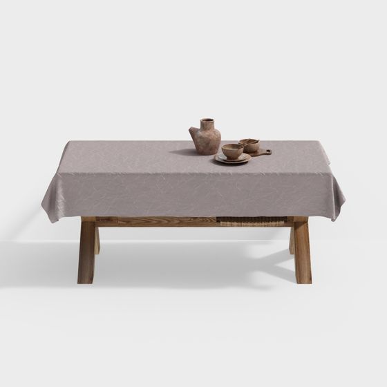 Low wooden coffee table with grey linen cloth and ceramic tea set on white background