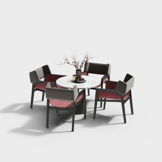 Modern round white marble dining table with four grey chairs on white background