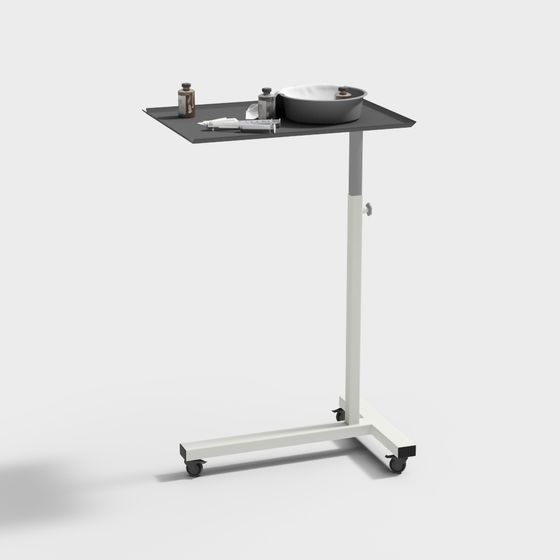 Medical rolling stand with black tray and white base holding tools on grey background