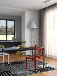 Modern dining area with black table colorful chairs patterned rug and large white floor lamp