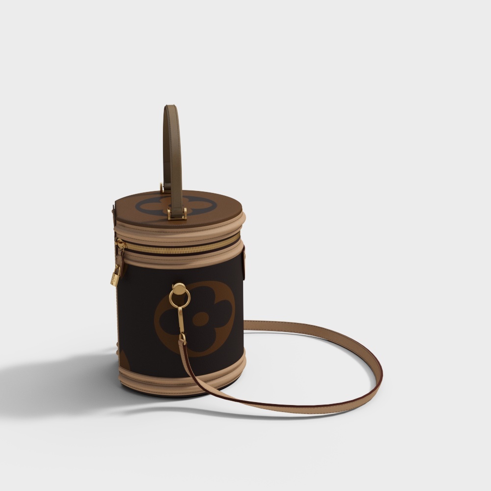 Brown leather round bag with gold zipper and long strap on grey background