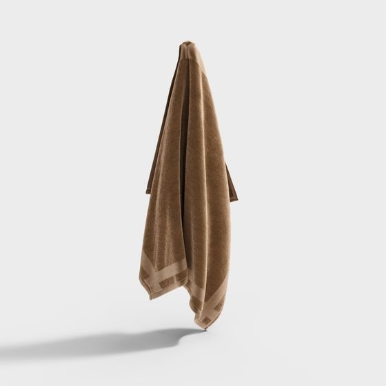Soft brown cotton towel with striped border design hanging on white background