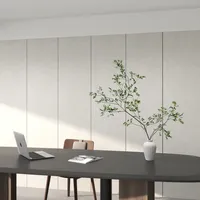 Modern dark grey table with laptop notebook chair and green plant in a white vase