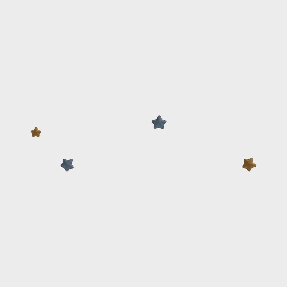 Small gold and blue star shaped wall stickers scattered on light grey background