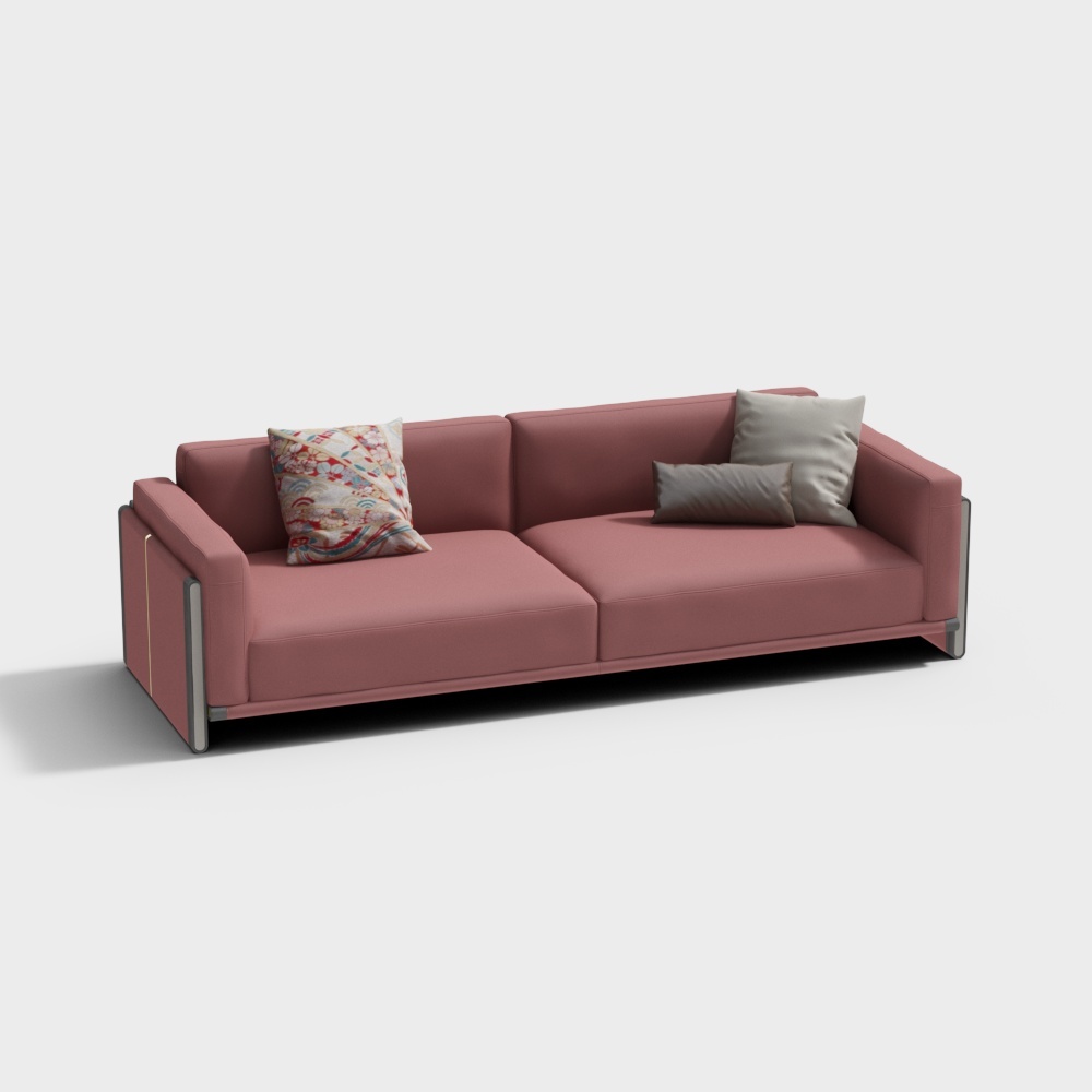 Modern pink sofa with silver legs and patterned pillows on white background
