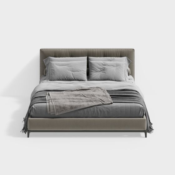 Modern grey upholstered bed with tall headboard and grey bedding on white background