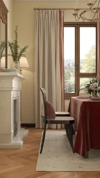 Warm dining room with marble fireplace red tablecloth wooden chairs beige curtains and natural light
