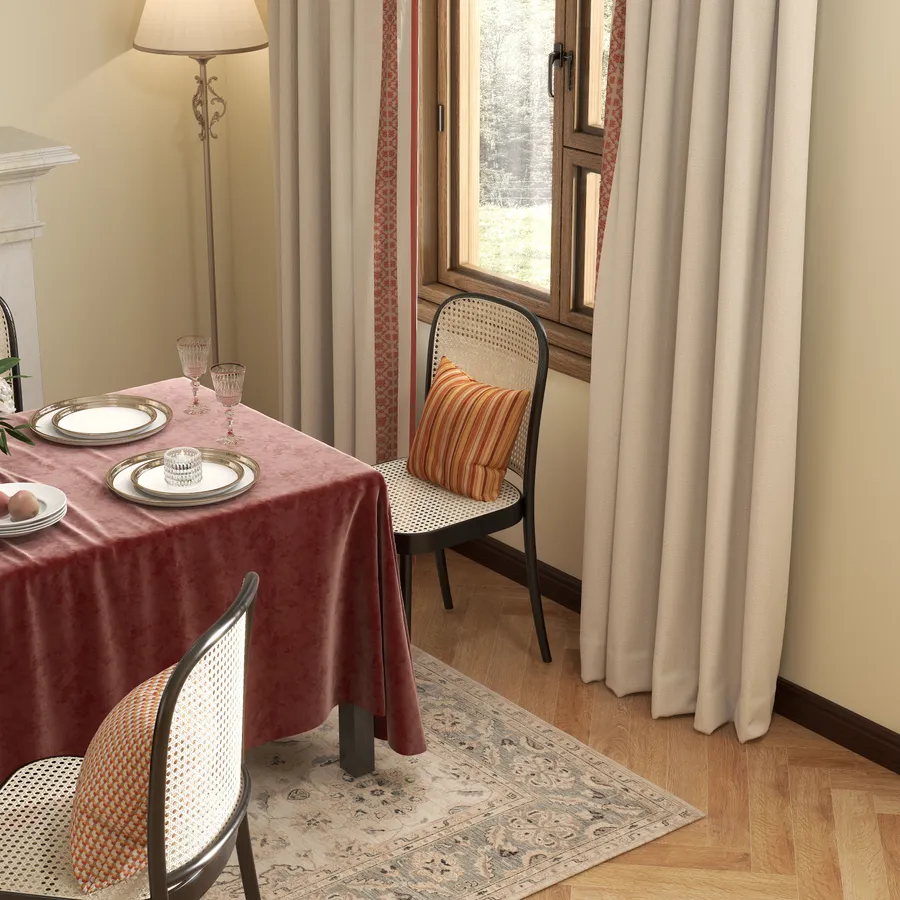 Traditional dining room with pink tablecloth wooden chairs patterned rug window curtains fireplace and lamp