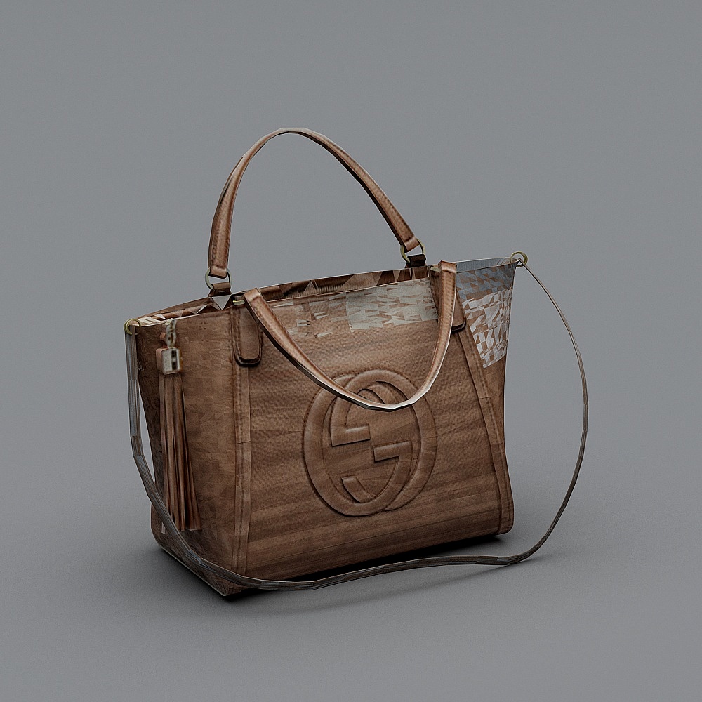 Brown leather handbag with long strap and gold logo on grey background