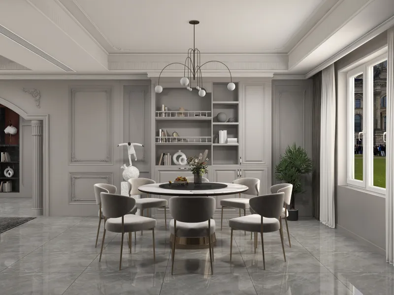 Elegant dining room featuring round marble table, grey chairs, wall panel, and modern ceiling light