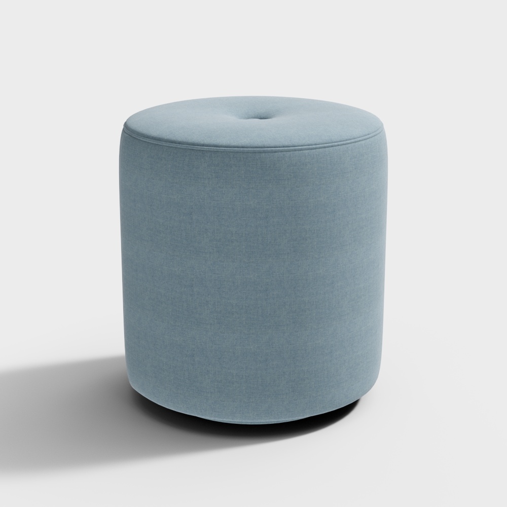 Round blue fabric footrest with button tufted top and soft texture on white background