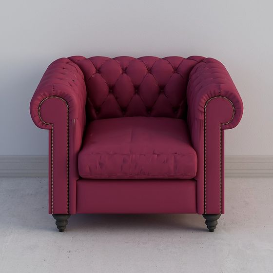Classic red leather armchair with tufted back and dark wooden legs on grey background