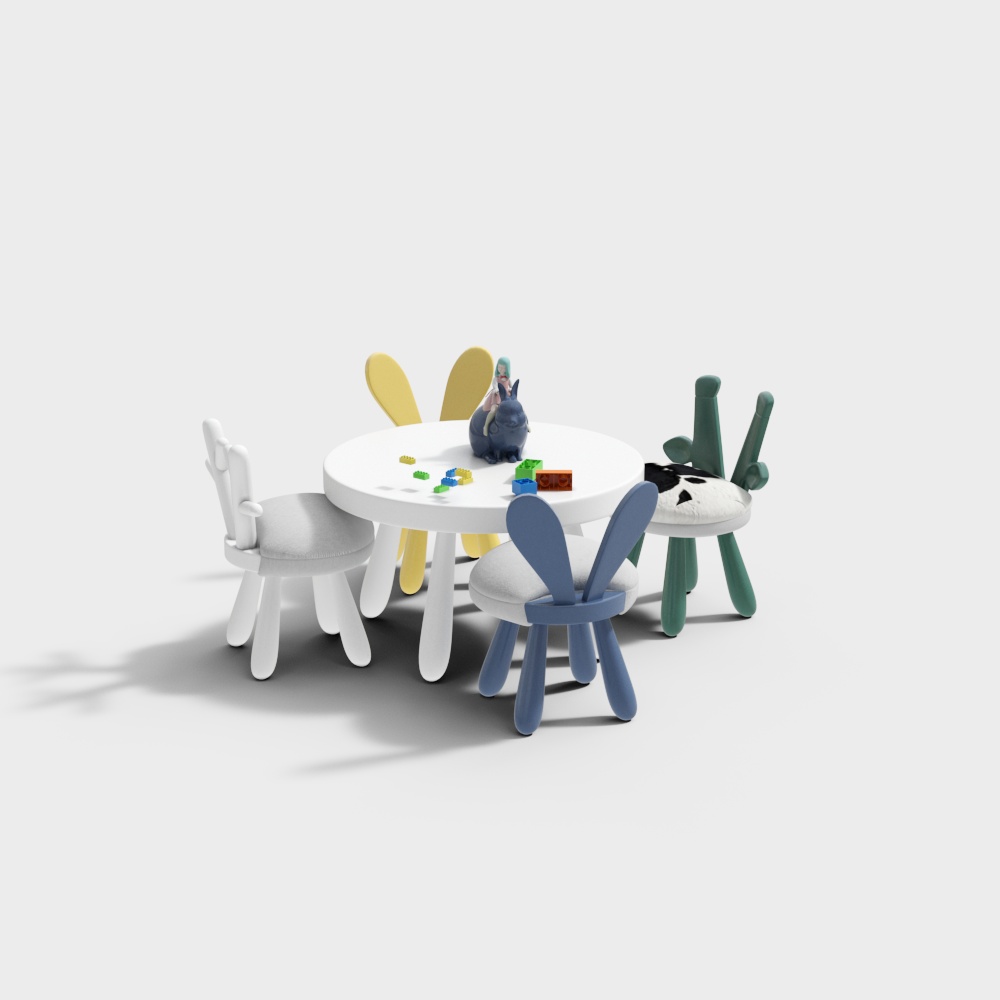 White round kids table with colorful rabbit chairs and toys on light grey background