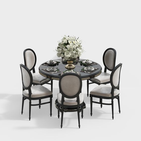 Round black dining table with gold trim and six grey upholstered chairs on white background