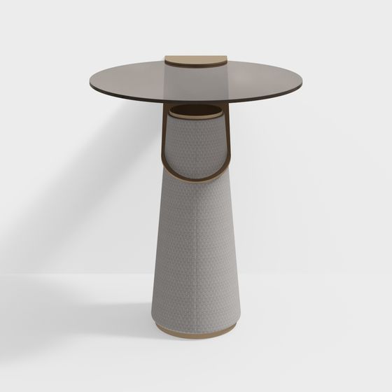 Modern round side table with grey glass top and textured cone base on white background