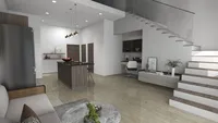 Open plan room with wood floors kitchen island office chair cabinet and stairs with railing