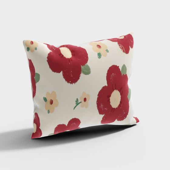 White decorative pillow with red flowers and green leaves on white background