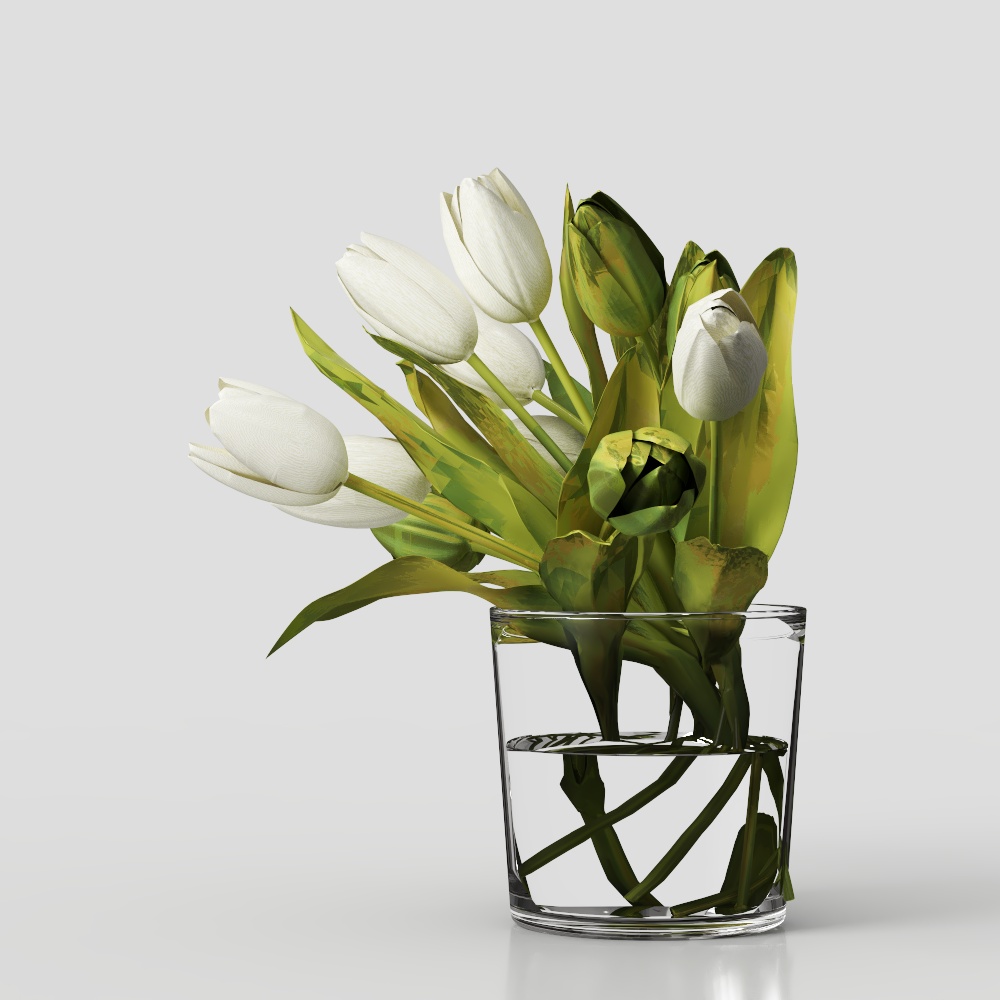 White tulips in clear glass vase with green leaves on grey background