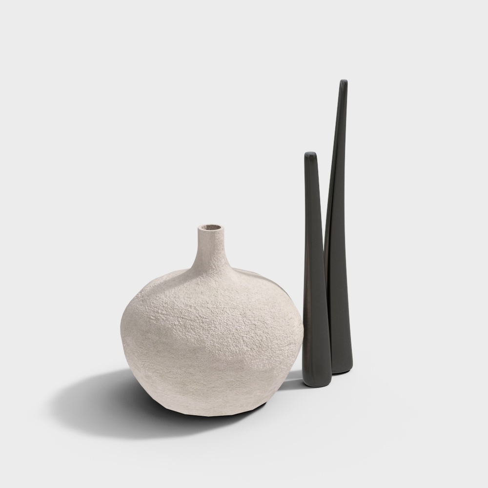 Round beige textured vase with two tall black vases on white background