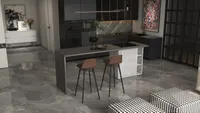 Modern kitchen interior design drawing featuring dark cabinets marble floor and two brown bar stools