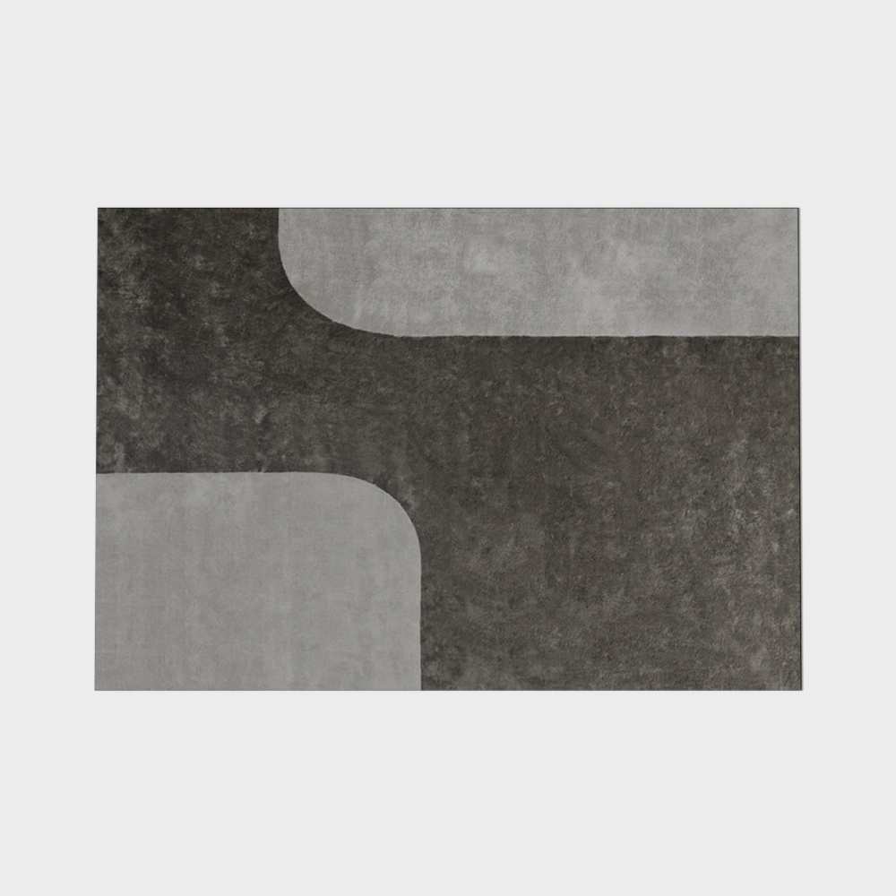 Modern grey and black area rug with geometric curved shapes on white background