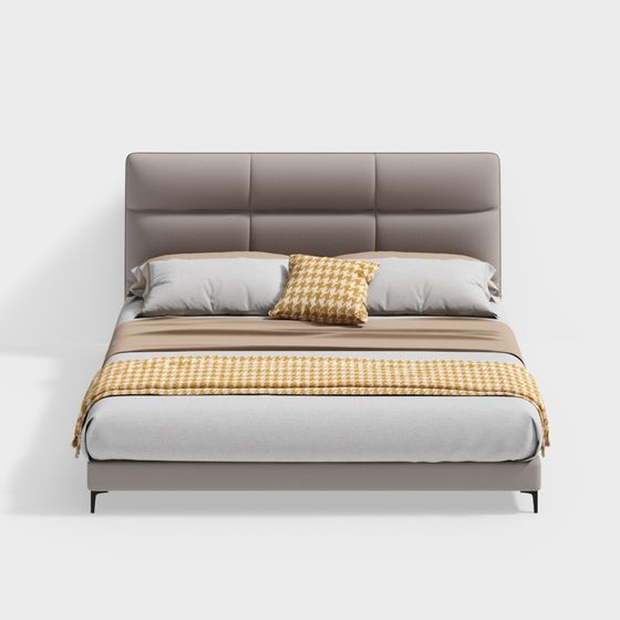Modern grey upholstered bed with white sheets and yellow patterned throw on white background