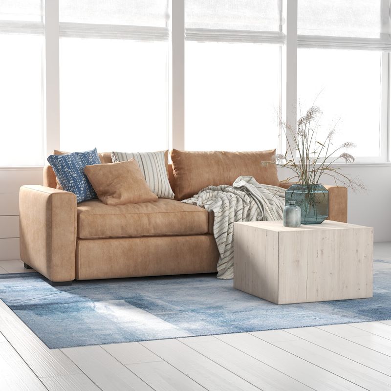 Cozy Living Room with Caramel Sofa