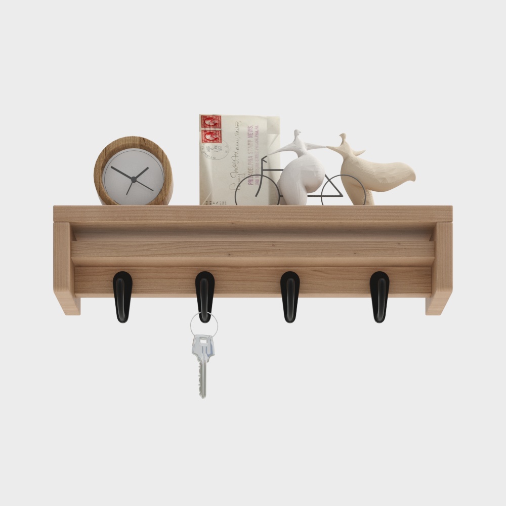 Light wood wall shelf with four black hooks holding keys and decor on white background