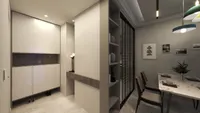 Entrance hallway with white storage cabinets next to a dining table with modern colored lights