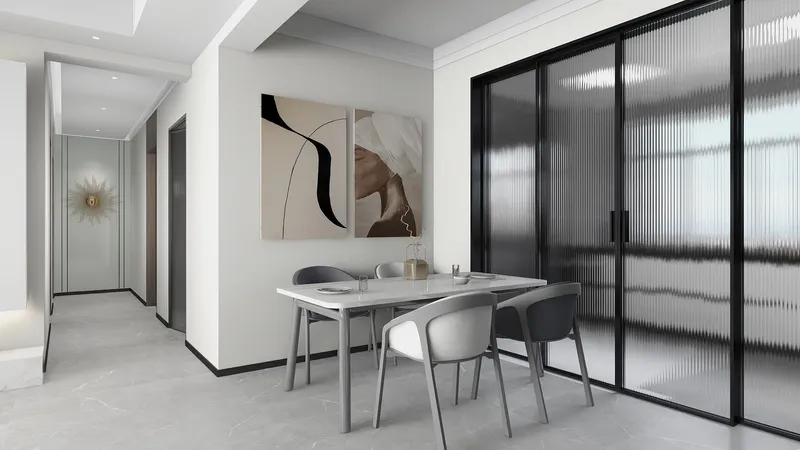 Modern dining room featuring marble table grey chairs wall art and black frame glass sliding doors