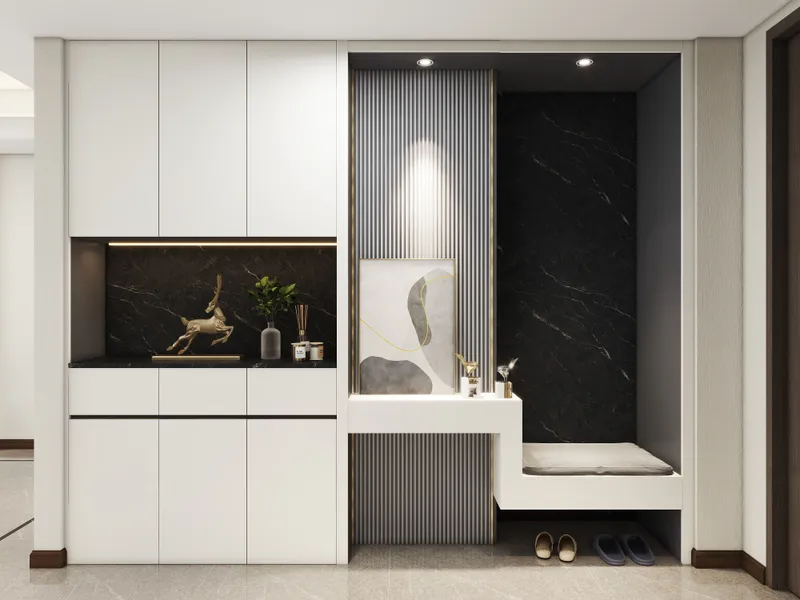 Modern entryway with white cabinets, black marble, padded seat, striped wall panel and ceiling light