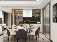 Modern dining area with round marble table, black chairs, white cabinets, wine storage, and floor