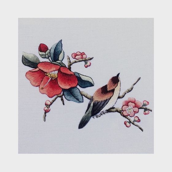Broderie d'oiseaux et de fleurs