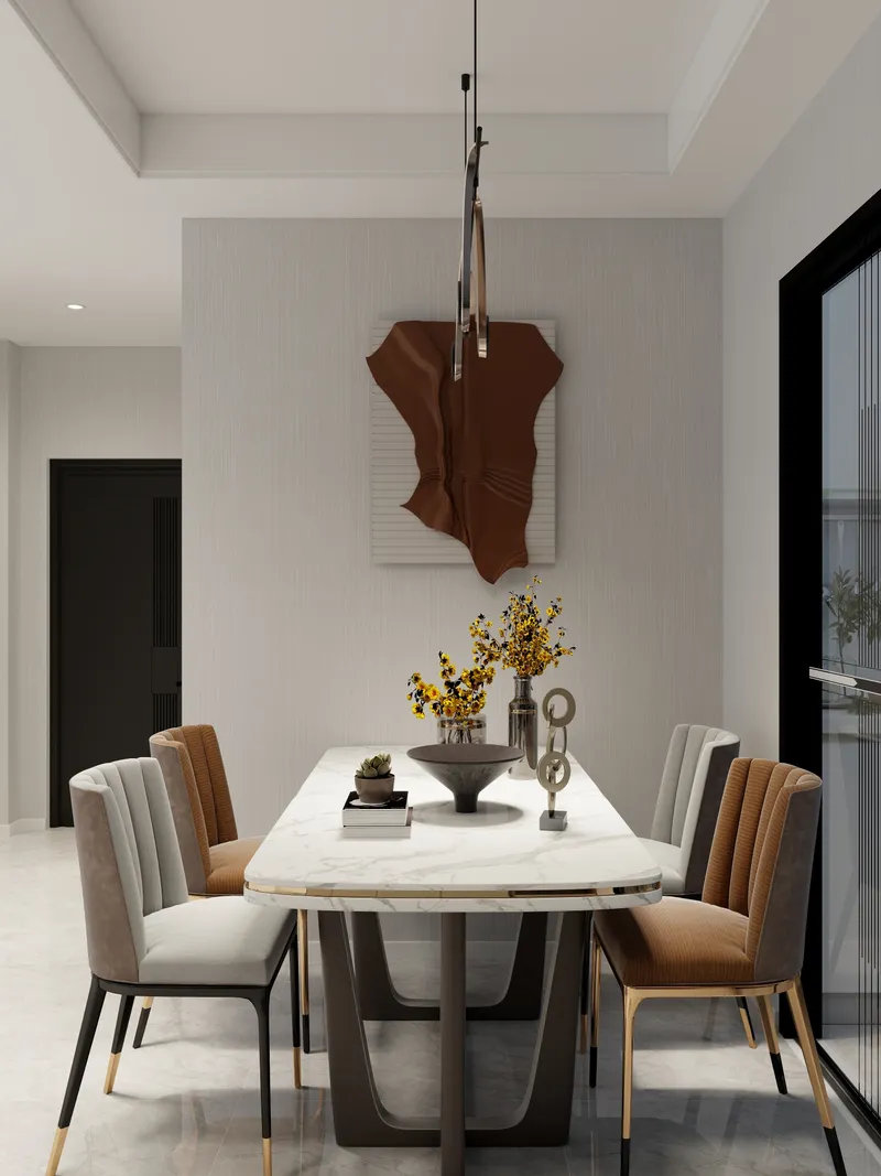 Modern dining room with white marble table grey and orange chairs yellow flowers wall art