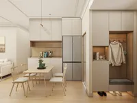 Modern dining room featuring wooden table four chairs silver fridge white cabinet and coat storage