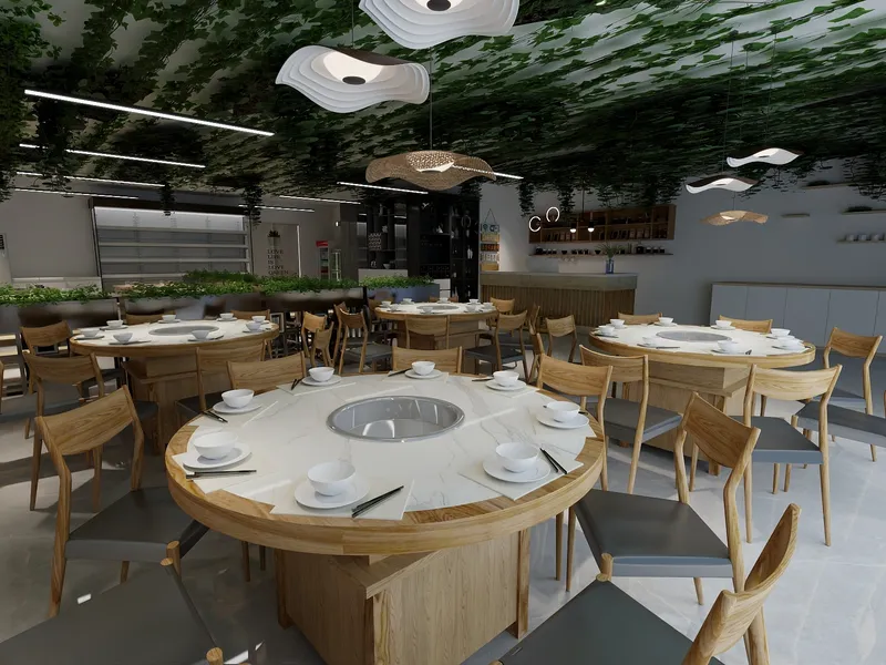 Modern restaurant interior with round wooden tables, green hanging plants, wooden chairs, and bright lights