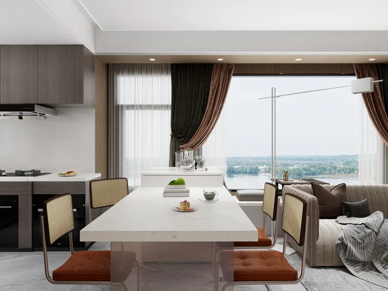 Modern dining area with white table, brown chairs, velvet sofa, and large window overlooking lake