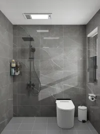 Modern grey marble bathroom with black shower head, white toilet, small trash can, and window blinds