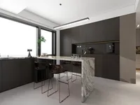 Modern kitchen with dark grey cabinets, marble island, bar stools, ceiling light, and large window