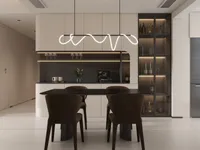 Modern dining room showing black table, brown chairs, glass wine cabinet, and curved ceiling light