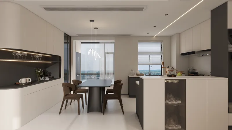 Modern open plan kitchen and dining room with black table, brown chairs, and white cabinets