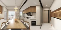 Open kitchen and dining room layout with wooden table white cabinets glass partition and entryway