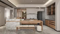 Modern kitchen featuring marble island wooden dining table white bench and two gold ceiling lights