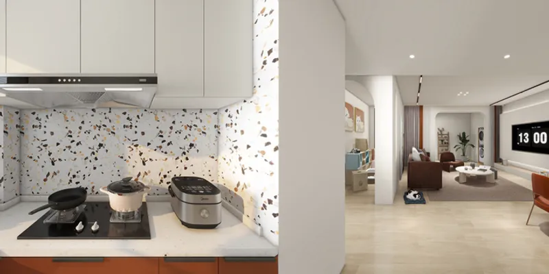 Modern kitchen with speckled wall rice cooker and stove looking into a bright living room