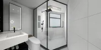 Modern white bathroom with glass shower toilet sink vanity unit bright wall mirror and tiles