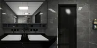 Modern bathroom vanity with two white sinks, black faucets, grey marble walls, and large wall mirror