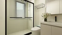 Small bathroom design showing glass shower door white toilet beige cabinet mirror and black faucet