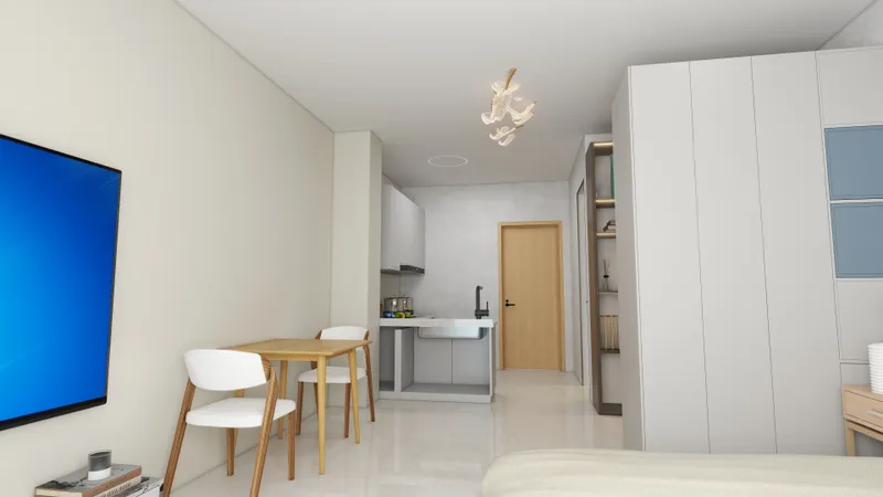 Small apartment interior with wooden dining table white chairs kitchen area and large white wardrobe