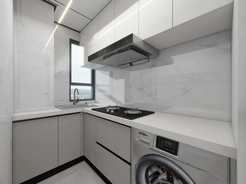 Modern small kitchen with white cabinets, marble walls, black stove, sink, and silver washing machine
