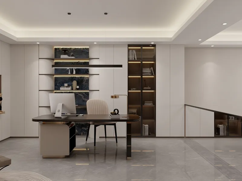Modern home office with dark desk, computer, white chair, tall lit cabinets, and marble shelves